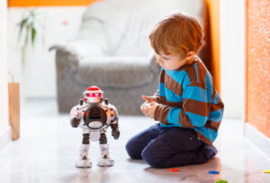 Photo of a Child Playing with Toy