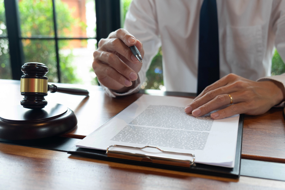 Photo of an Attorney Reading a Document