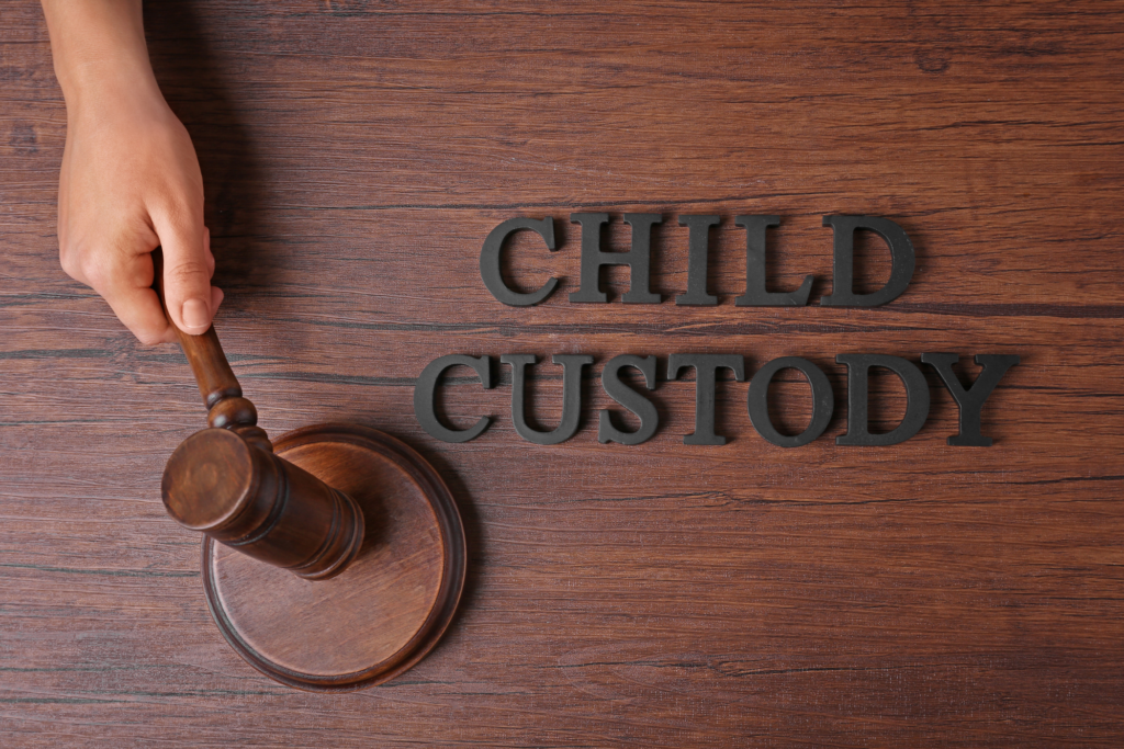 gavel on desk with words "child custody"
